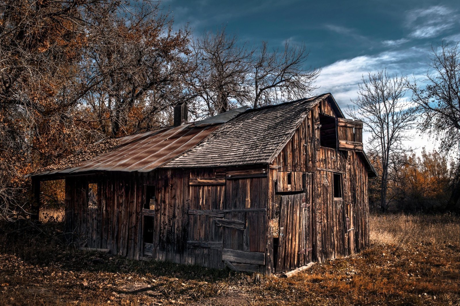 Weathered Old Barn under a Stormy Sky