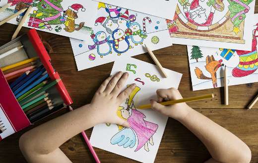 Kid busy coloring