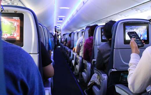 Airplane inside with passengers