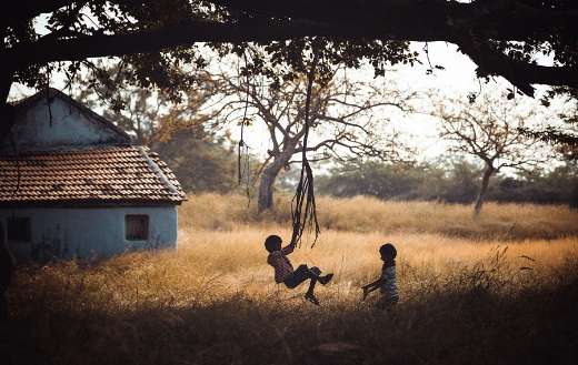 Children playing swing
