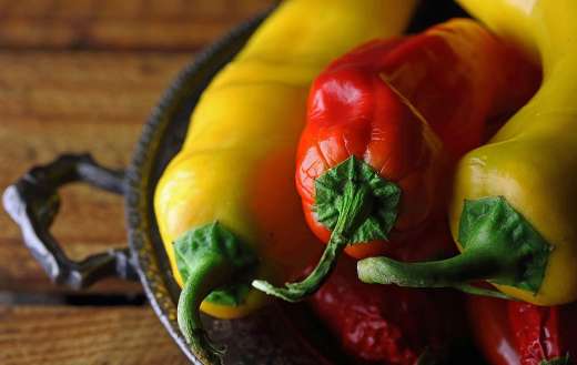 Selection of long red and yellow peppers