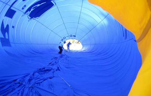 Shows inflation of the balloon upright