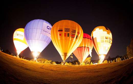 Night glow time where hot air balloons