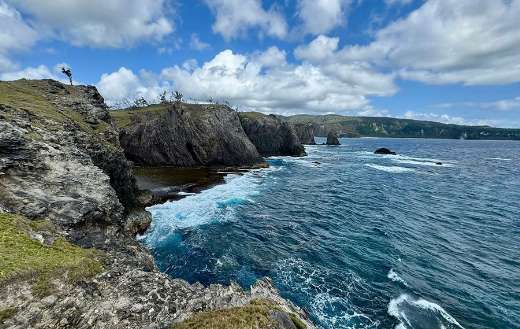 Rocky coastline of Nagudungan hill on Calayan Island Philippines