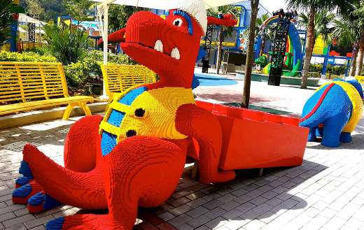 Striking statue of red LEGO dragon