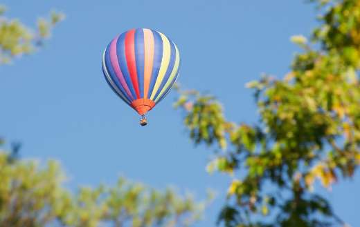Colorful hot air balloon with vertical stripes