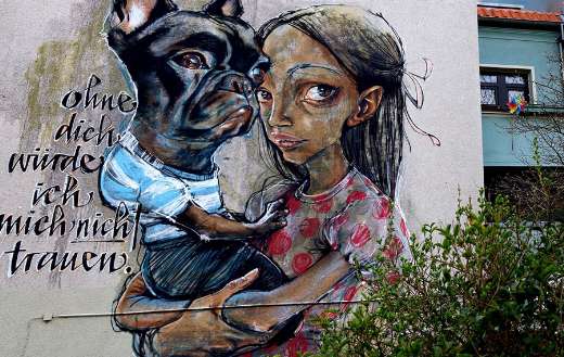 Girl holding a dog mural