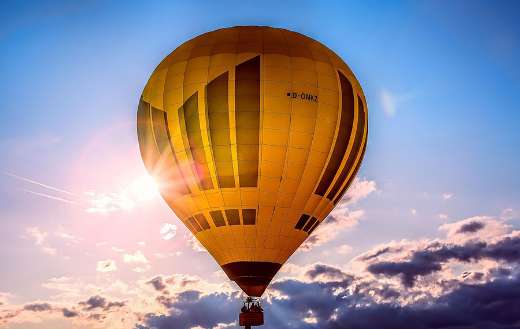 Yellow hot air balloon with D OMKZ