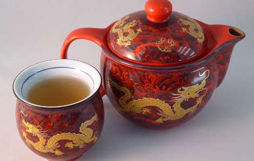 Red chinese porcelain with tea