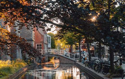 This picturresque canal scene Delft Netherlands historic waterway